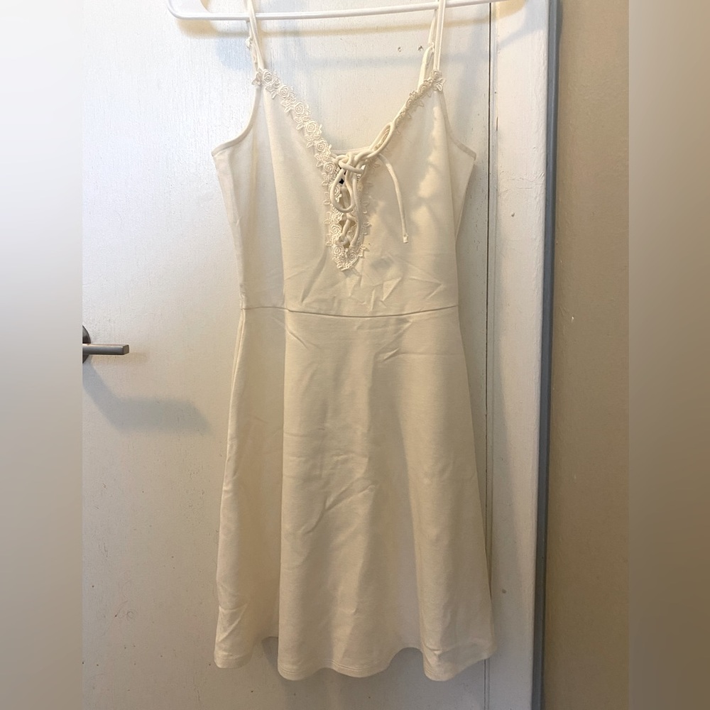 Divided H&M size 6 cream dress with a lace neckline